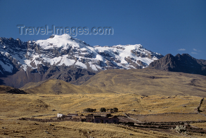 peru114: Puno department, Peru: hills with snow - the Andes and the high Altiplano as seen from the train from Puno to Cusco - photo by C.Lovell - (c) Travel-Images.com - Stock Photography agency - Image Bank