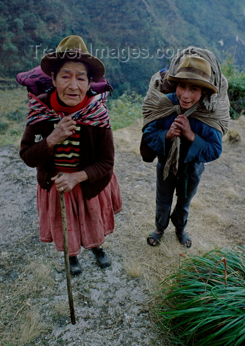 peru180: Inca Trail, Cuzco region, Peru: Quechua grandmother and grandson hike along the Inca Trail - photo by C.Lovell - (c) Travel-Images.com - Stock Photography agency - Image Bank