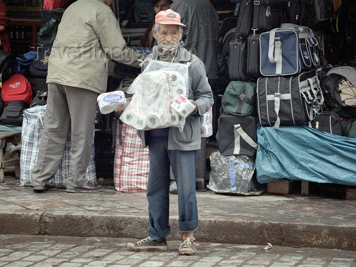 peru63: Cuzco, Peru: toilet paper seller - market scene - photo by M.Bergsma - (c) Travel-Images.com - Stock Photography agency - Image Bank