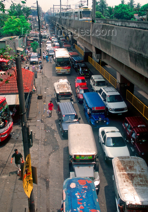 phil35: Metro Manila, Philippines - Elevated Light Rail Track LRT and traffic - photo by B.Henry - (c) Travel-Images.com - Stock Photography agency - Image Bank