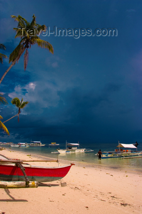 phil49: Alona Beach, Bohol island, Central Visayas, Philippines: local bancas on a white sand beach with storm clouds - photo by S.Egeberg - (c) Travel-Images.com - Stock Photography agency - Image Bank
