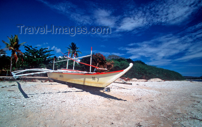 phil7: Philippines - Beach - local catamaran -  photo by B.Henry - (c) Travel-Images.com - Stock Photography agency - Image Bank