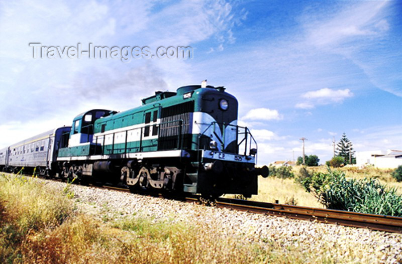 portugal-fa93: Portugal - Algarve - Tunes (Concelho de Albufeira): train leaving town - o comboio a estação - photo by Tony Purbrook - (c) Travel-Images.com - Stock Photography agency - Image Bank