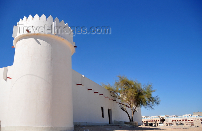 qatar23: Doha, Qatar: Kuwt / Khoot / Koot fort, 19th century Turkish fortification later used as a prison - east side and Souq Waqif - photo by M.Torres - (c) Travel-Images.com - Stock Photography agency - Image Bank