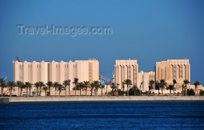 qatar51: Doha, Qatar: harbour cereal silos with local architecture inspiration - Qatar Flour Mills Co.- photo by M.Torres - (c) Travel-Images.com - Stock Photography agency - Image Bank