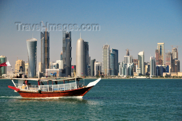 qatar55: Doha / Ad Dawhah, Qatar: water taxi dhow on Doha bay and West Bay skyline from the south side of Doha Bay - photo by M.Torres - (c) Travel-Images.com - Stock Photography agency - Image Bank