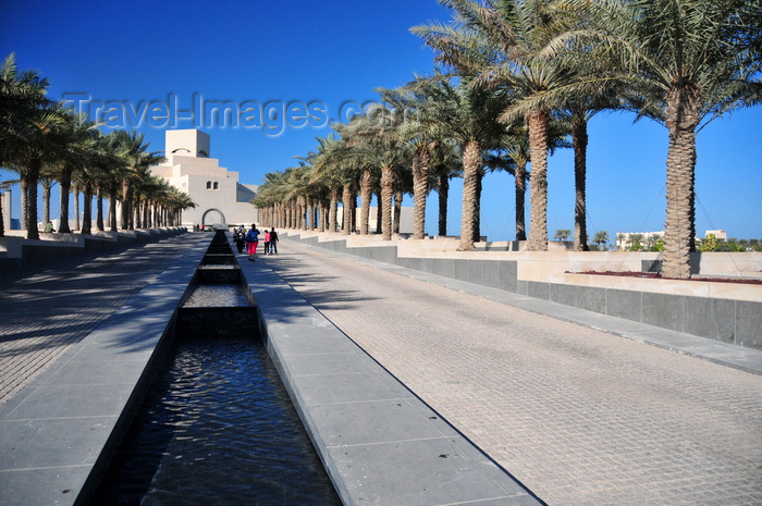 qatar66: Doha, Qatar: avenue of water and palm trees between the Corniche and the Museum of Islamic Art - architect I.M. Pei - photo by M.Torres - (c) Travel-Images.com - Stock Photography agency - Image Bank