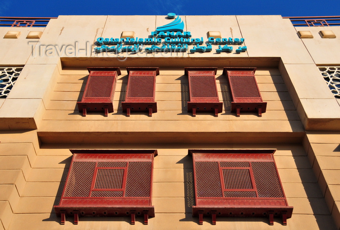 qatar84: Doha, Qatar: Qatar Islamic Cultural Center, FANAR - stone facade with arabian enclosed oriel windows with carved wood - Mashrabiya or Shanasheel - photo by M.Torres - (c) Travel-Images.com - Stock Photography agency - Image Bank