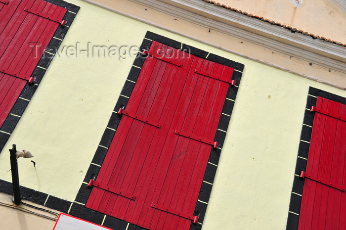 reunion195: Saint-Denis, Réunion: red doors at Club 138 - Rue de l'Amiral Lacaze - Trésor Publique - photo by M.Torres - (c) Travel-Images.com - Stock Photography agency - Image Bank