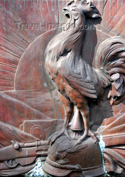 reunion207: Saint-Denis, Réunion: the French rooster over an Imperial German spiked Helmet/ Pickelhaube - Victory Column detail - photo by M.Torres - (c) Travel-Images.com - Stock Photography agency - Image Bank