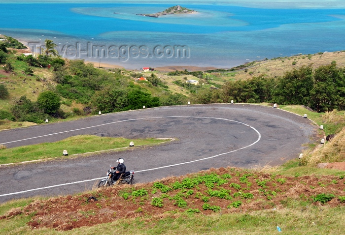 rodrigues31: Pompée, Rodrigues island, Mauritius: motorbike climbing the winding road - lagoon and Hermitage island in the background - photo by M.Torres - (c) Travel-Images.com - Stock Photography agency - Image Bank