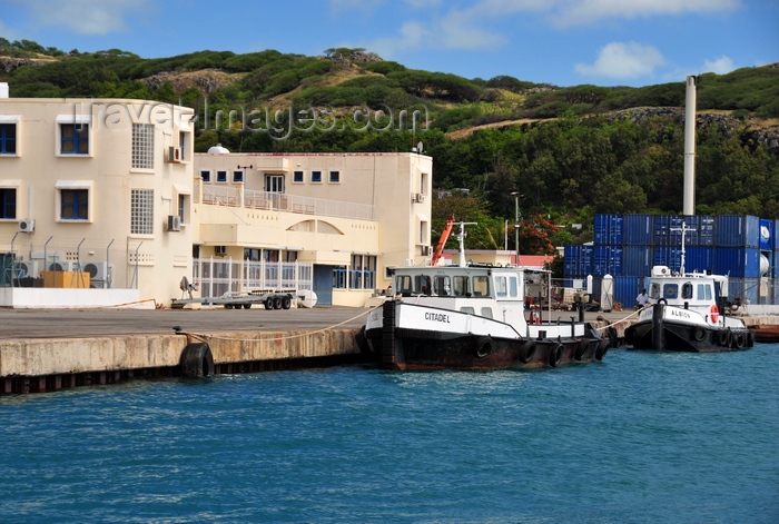 rodrigues53: Port Mathurin, Rodrigues island, Mauritius: tugboats docked in the harbor - shipping containers in the background - photo by M.Torres - (c) Travel-Images.com - Stock Photography agency - Image Bank