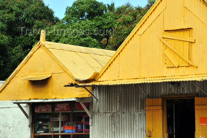 rodrigues60: Port Mathurin, Rodrigues island, Mauritius: local commerce - corrugated zinc building - photo by M.Torres - (c) Travel-Images.com - Stock Photography agency - Image Bank