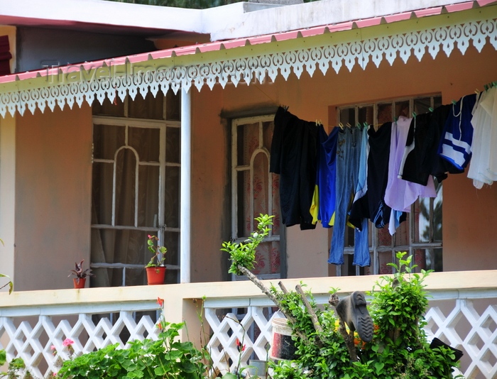 rodrigues73: La Ferme, Rodrigues island, Mauritius: creole house with ornate eaves and clothes line - photo by M.Torres - (c) Travel-Images.com - Stock Photography agency - Image Bank