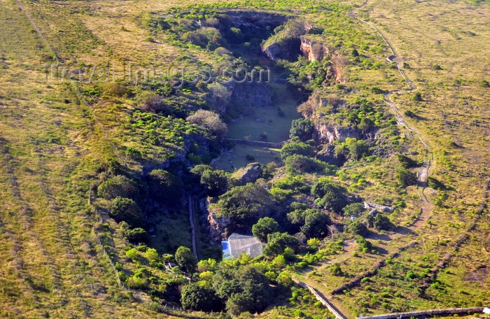 rodrigues79: Caverne Patate, Rodrigues island, Mauritius: caves entrance seen from the air - photo by M.Torres - (c) Travel-Images.com - Stock Photography agency - Image Bank