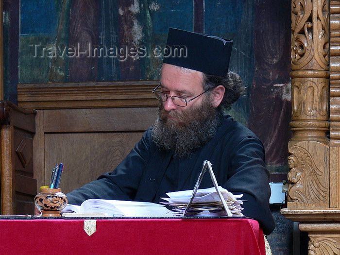 romania122: Târgu Neamt area, Neamt county, Moldavia, Romania: Orthodox monk at work - dispatch - Neamt Monastery - photo by J.Kaman - (c) Travel-Images.com - Stock Photography agency - Image Bank