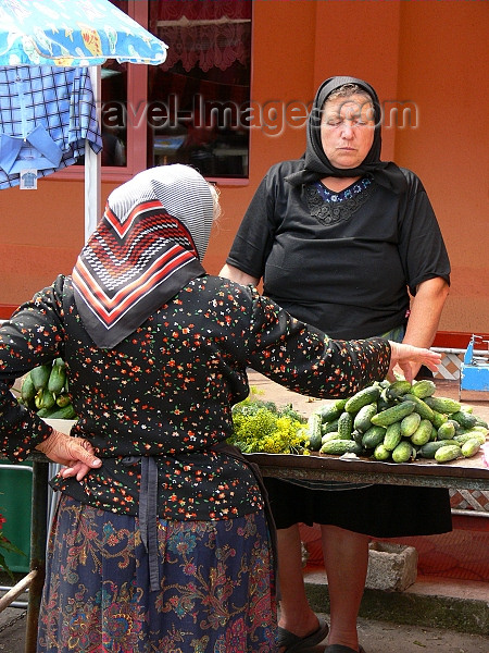 romania143: Sighetu Marmatiei, Maramures county, Transylvania, Romania: women and cocumbers at the market - photo by J.Kaman - (c) Travel-Images.com - Stock Photography agency - Image Bank