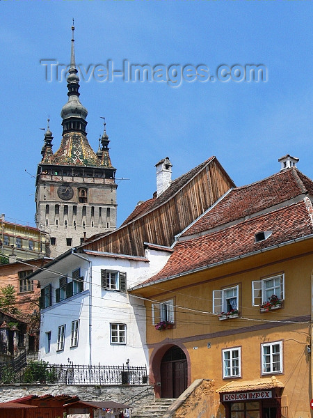 romania66: Sighisoara / Segesvár, Mures county, Transylvania, Romania: clock tower, aka Tower of the Council, housing the Museum of History - buildings of the Citadel - UNESCO listed town of Sighisoara - Cetatea - photo by J.Kaman - (c) Travel-Images.com - Stock Photography agency - Image Bank