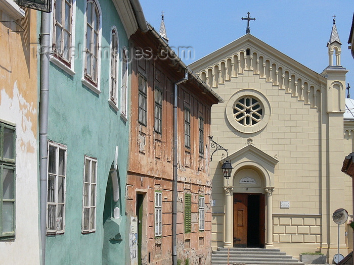 romania69: Sighisoara / Segesvár, Mures county, Transylvania, Romania: houses on Zidul Cetatii street and the Roman Catholic church of St Joseph - Biserica Romano-Catolica Sf. Iosif - photo by J.Kaman - (c) Travel-Images.com - Stock Photography agency - Image Bank