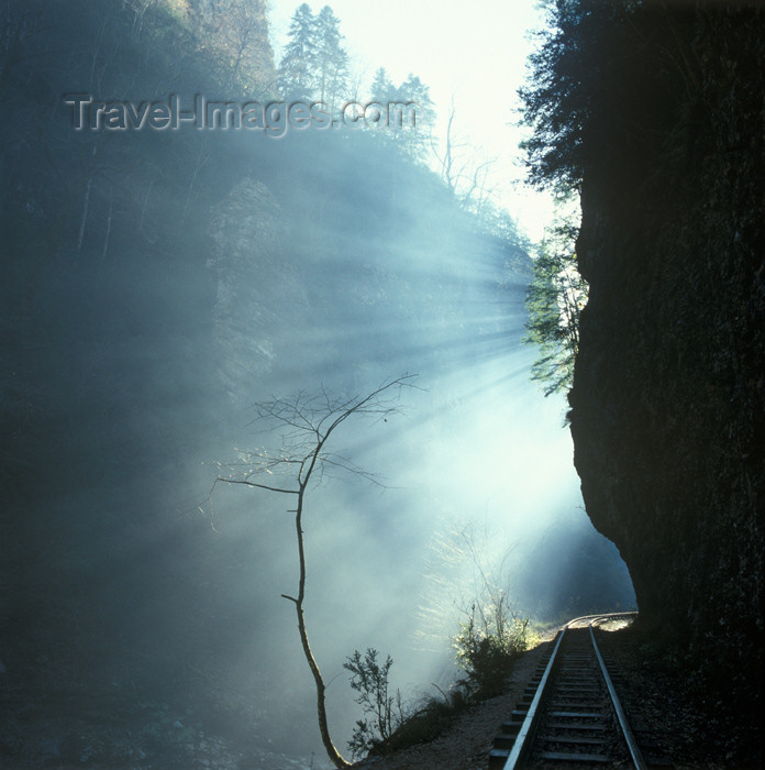 russia366: Russia - Guamskoe gorge - Krasnodar kray: ray of light over the railway line - photo by Vladimir Sidoropolev - (c) Travel-Images.com - Stock Photography agency - Image Bank