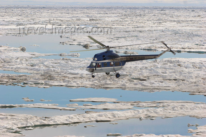 russia426: Russia - Bering Strait (Chukotka AOk): MI-2 helicopter ferries passengers over the ice (photo by R.Eime) - (c) Travel-Images.com - Stock Photography agency - Image Bank