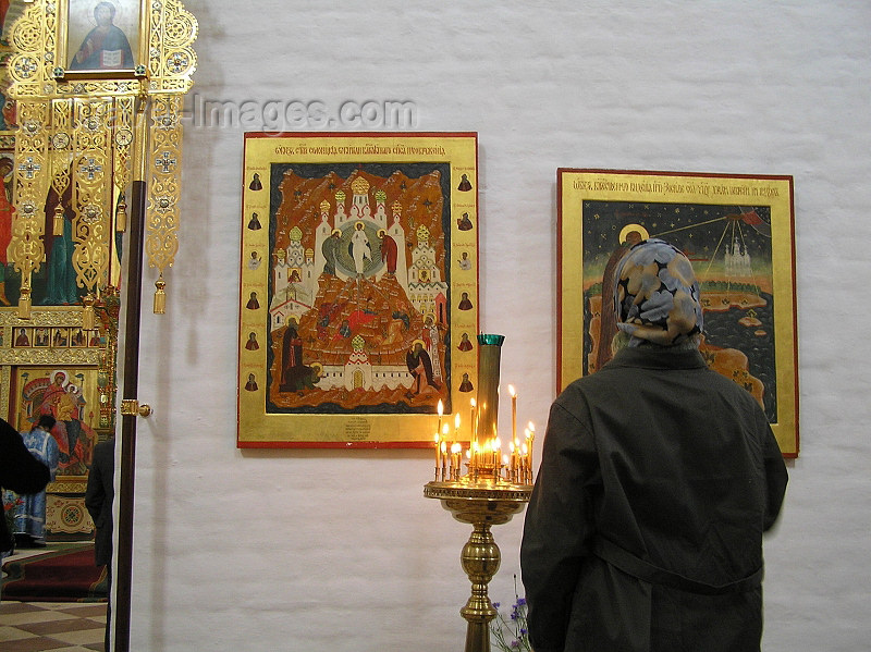 russia602: Russia - Solovetsky Islands: Inside Transfiguration Cathedral - woman praying - photo by J.Kaman - (c) Travel-Images.com - Stock Photography agency - Image Bank