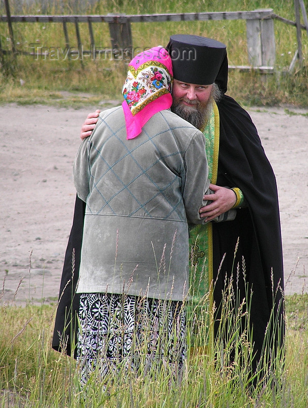 russia620: Russia - Solovetsky Islands: Russian Orthodox Priest - comforting a member of the flock - photo by J.Kaman - (c) Travel-Images.com - Stock Photography agency - Image Bank