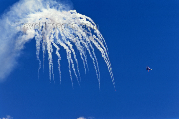 russia742: Russia - Gelendjik - Krasnodar kray: aviation show - Mikoyan-Gurevich MiG-29 Fulcrum fighter in flight - escapes missile explosion - Russian military aircraft - photo by V.Sidoropolev - (c) Travel-Images.com - Stock Photography agency - Image Bank