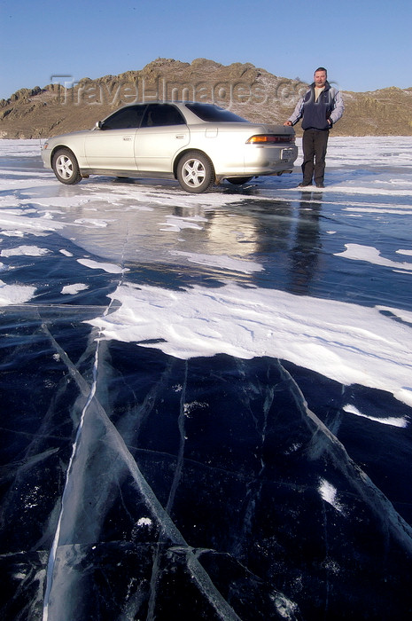 russia752: Lake Baikal, Irkutsk oblast, Siberian Federal District, Russia: car on the frozen lake surface - locals routinely drive on the ice - photo by B.Cain - (c) Travel-Images.com - Stock Photography agency - Image Bank
