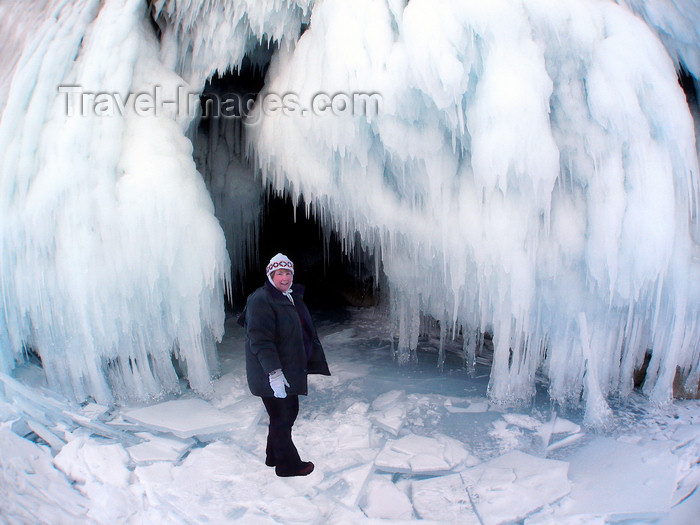 russia757: Lake Baikal, Irkutsk oblast, Siberian Federal District, Russia: woman at the entrance of an ice cave on Olkhon island - photo by B.Cain - (c) Travel-Images.com - Stock Photography agency - Image Bank