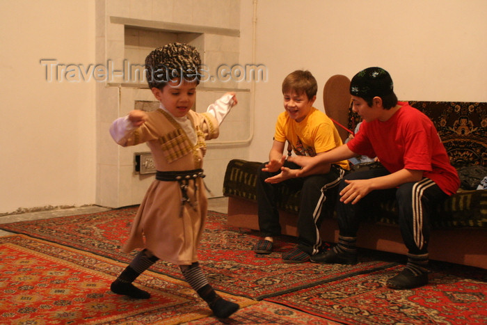 russia773: Chechnya, Russia - a boy wearing Chechen national costume and dancing traditional Chechen dance - photo by A.Bley - (c) Travel-Images.com - Stock Photography agency - Image Bank