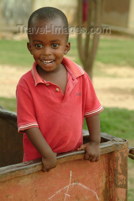 rwanda6: Rwanda: inquisitive boy in the back of a truck - photo by J.Banks - (c) Travel-Images.com - Stock Photography agency - Image Bank