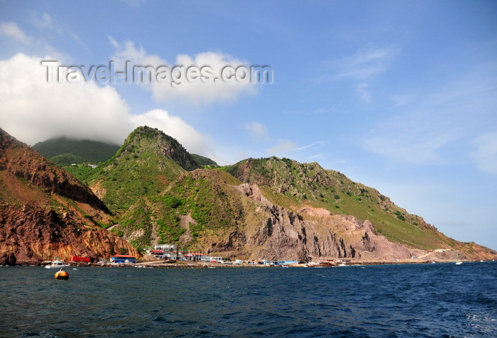 saba51: Fort Bay, Saba: harbour and hills seen from the sea - jagged volcanic landscape - photo by M.Torres - (c) Travel-Images.com - Stock Photography agency - Image Bank