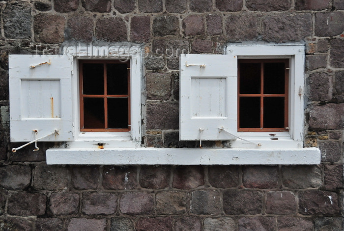 saba55: The Bottom, Saba: Sacred Heart Church - small windows on a stone wall - photo by M.Torres - (c) Travel-Images.com - Stock Photography agency - Image Bank