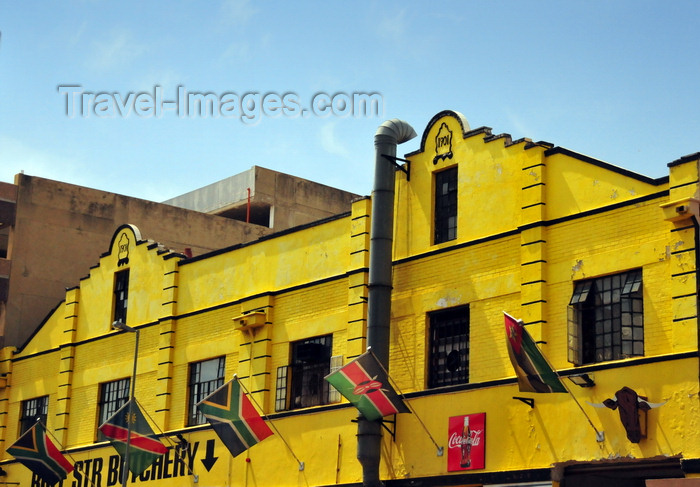 safrica221: Johannesburg, Gauteng, South Africa: Bree St - yellow façades of historical wharehouses with SADC countries flags - photo by M.Torres - (c) Travel-Images.com - Stock Photography agency - Image Bank