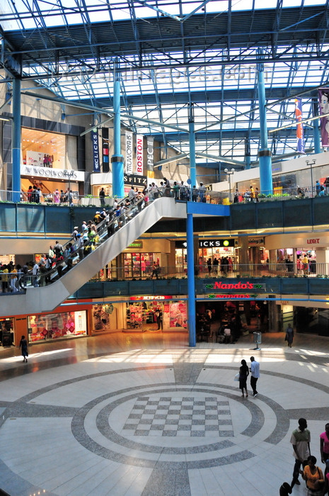 safrica237: Johannesburg, Gauteng, South Africa: Carlton Center - shopping mall interior - escalator and giant chess board - Nando's - architects Skidmore, Owings and Merrill - CBD - the tallest building in Africa - photo by M.Torres - (c) Travel-Images.com - Stock Photography agency - Image Bank