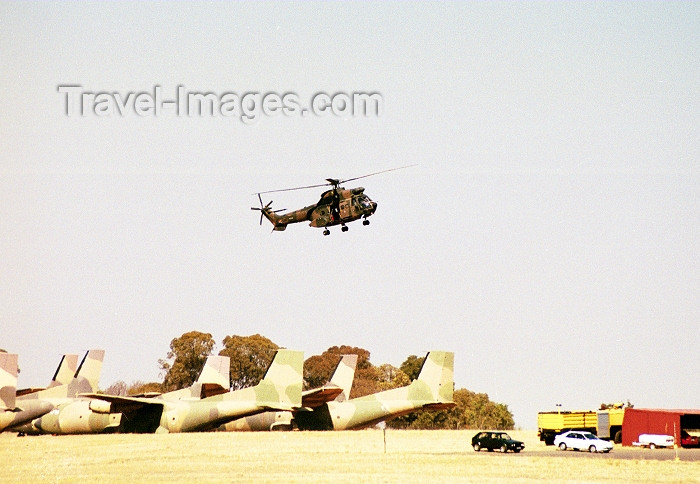 safrica86: Waterkloof, Gauteng, South Africa: Aerospatiale, SA-330J Puma above several CASA CN-235 - SAAF airforce base - Centurion - Verwoerdburg - photo by J.Stroh - (c) Travel-Images.com - Stock Photography agency - Image Bank