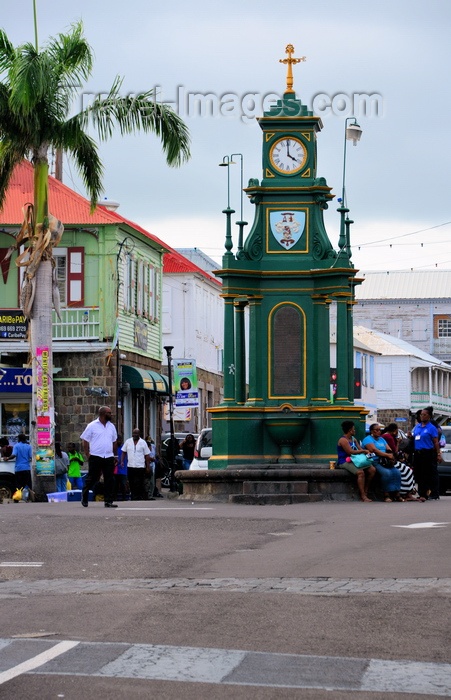 saint-kitts-nevis22: Basseterre, Saint Kitts island, Saint Kitts and Nevis: people at the Berkeley Memorial Clock - the Circus roundabout - drinking fountain - photo by M.Torres - (c) Travel-Images.com - Stock Photography agency - Image Bank