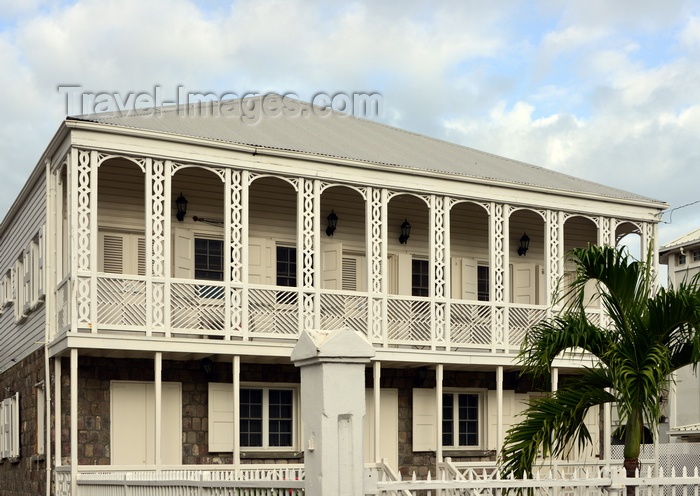 saint-kitts-nevis28: Basseterre, Saint Kitts island, Saint Kitts and Nevis: ornate wooden façade on Independence Sqaure - Caribbean architecture - photo by M.Torres - (c) Travel-Images.com - Stock Photography agency - Image Bank