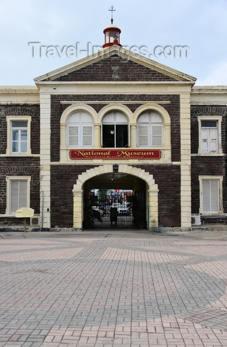 saint-kitts-nevis32: Basseterre, Saint Kitts island, Saint Kitts and Nevis: the Treasury Building - the arch was the entrance gate to the island in British colonial times - National Museum - photo by M.Torres - (c) Travel-Images.com - Stock Photography agency - Image Bank