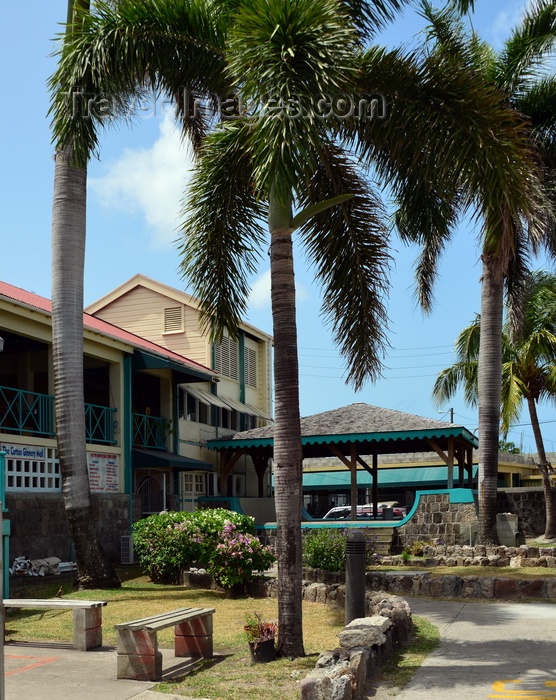 saint-kitts-nevis44: Charlestown, Nevis, St Kitts and Nevis, July 6th, 2018: view of the garden of the Cotton Ginnery Mall, housing government services and businesses, a former ginnery, where ginning (removing the seeds from cotton) was done - photo by M.Torres - (c) Travel-Images.com - Stock Photography agency - Image Bank