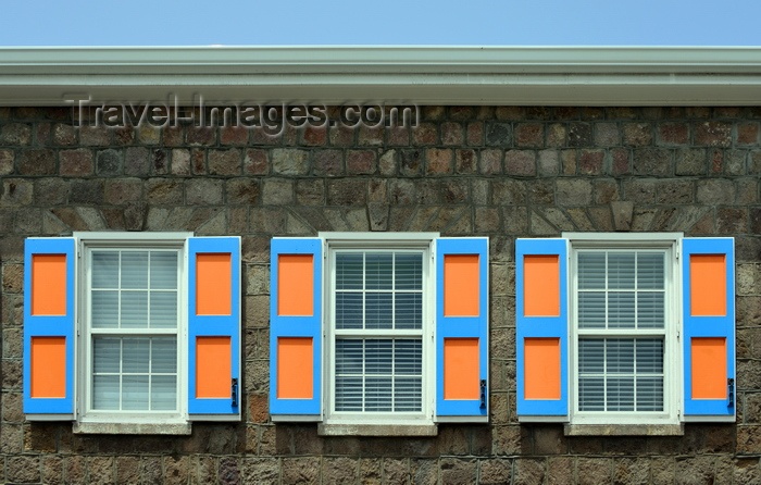 saint-kitts-nevis76: Charlestown, Nevis, St Kitts and Nevis: stone facade with colourful window shutters - Creole architecture - TDC building - photo by M.Torres - (c) Travel-Images.com - Stock Photography agency - Image Bank