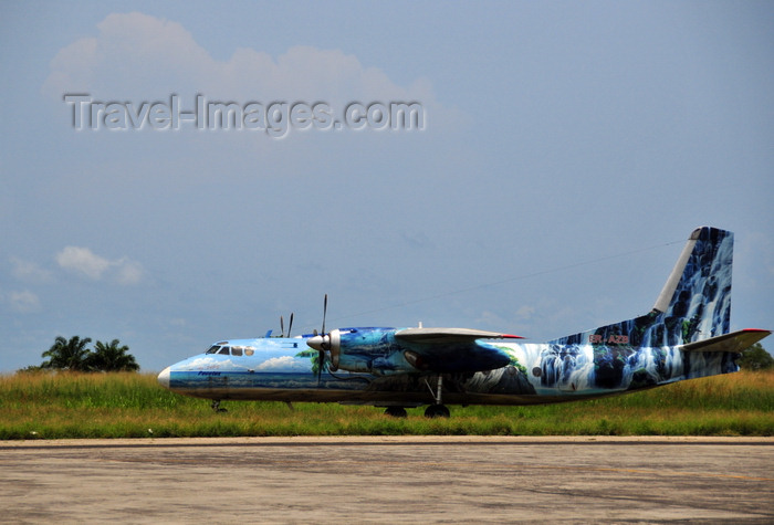 sao-tome203: São Tomé, Água Grande district, São Tomé and Príncipe / STP: São Tomé International Airport - Pecotox Air Antonov AN-24RV - ER-AZB, cn 075-07 - aircraft in tropical color scheme / Antonov 24 Coke no Aeroporto Internacional de São Tomé  - photo by M.Torres - (c) Travel-Images.com - Stock Photography agency - Image Bank