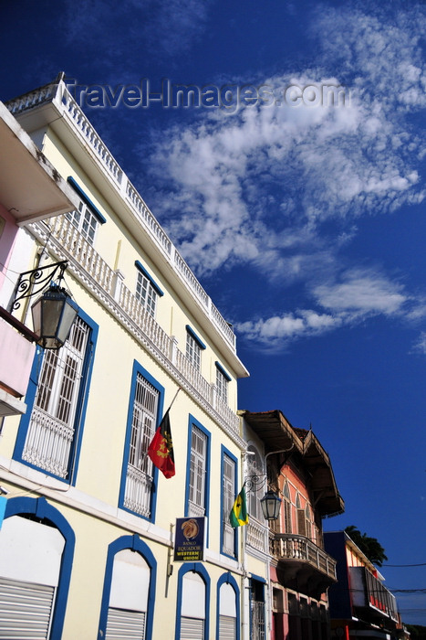 sao-tome262: São Tomé, São Tomé and Príncipe / STP: Equador Bank - Western Union branch - flags of Angola and STP / Banco Equador - Rua de Moçambique - photo by M.Torres - (c) Travel-Images.com - Stock Photography agency - Image Bank