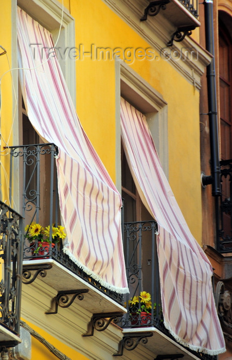 sardinia104: Iglesias /  Igrèsias, Carbonia-Iglesias province, Sardinia / Sardegna / Sardigna: courtains outside the balconies, protecting against the heat - Piazza A.Lamarmora - photo by M.Torres - (c) Travel-Images.com - Stock Photography agency - Image Bank