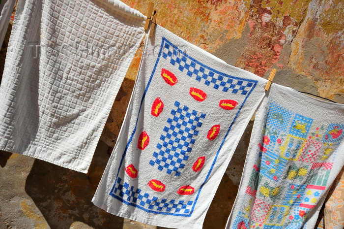 sardinia110: Iglesias /  Igrèsias, Carbonia-Iglesias province, Sardinia / Sardegna / Sardigna: kitchen towels drying outside - photo by M.Torres - (c) Travel-Images.com - Stock Photography agency - Image Bank