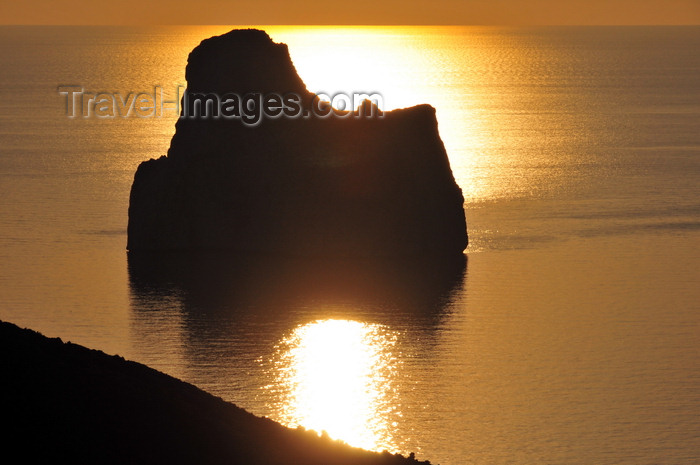 sardinia131: Porto Flavia, Masua, Sardinia / Sardegna / Sardigna: Pan di Zucchero islet at sunset - golden reflection on the Gonnesa gulf - faraglione - photo by M.Torres - (c) Travel-Images.com - Stock Photography agency - Image Bank