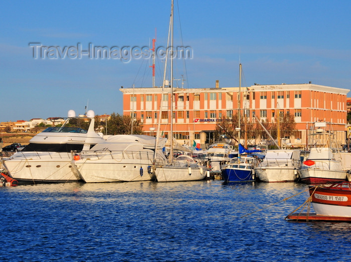 sardinia185: Porto Torres / Pòltu Tòrra, Sassari province, Sardinia / Sardegna / Sardigna: the harbour, built over its Roman predecessor - yachts and Coast Guard building - Cormorano Marina - photo by M.Torres - (c) Travel-Images.com - Stock Photography agency - Image Bank