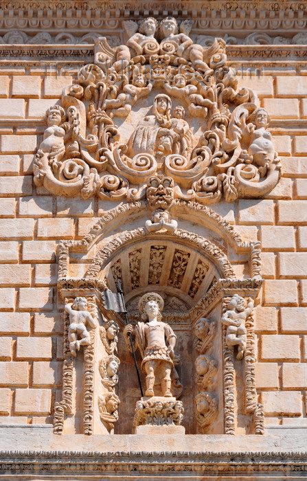 sardinia222: Sassari / Tàthari , Sassari province, Sardinia / Sardegna / Sardigna: Cathedral of St. Nicholas of Bari - niche with St Gianuario killed in Porto Torres in the 4th century AD, one of the 'martiri turritani' - medallion with the Madonna del Bosco - façade detail  - photo by M.Torres - (c) Travel-Images.com - Stock Photography agency - Image Bank