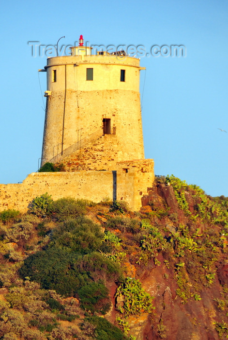 sardinia252: Pula, Cagliari province, Sardinia / Sardegna / Sardigna: Spanish tower of Sant´Efisio / Coltelazzo - lighthouse on Cape Pula - coastal tower built overlooking the ruins of Nora - Gulf of Cagliari - Sulcis-Iglesiente region - photo by M.Torres - (c) Travel-Images.com - Stock Photography agency - Image Bank